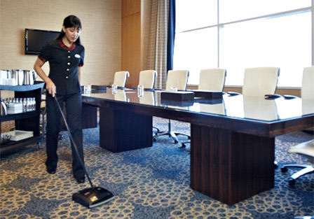 Carpet cleaning by hotel staff