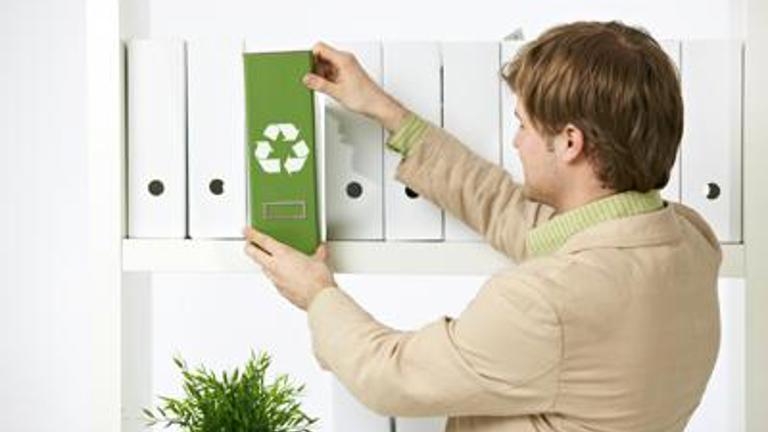 Man fixing the file holders and dividers